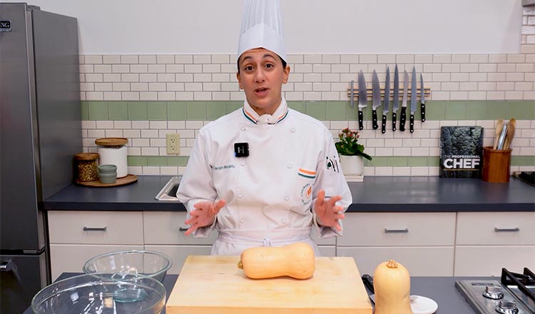 CIA chef breaking down a butternut squash