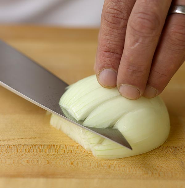 Chopping a yellow onion